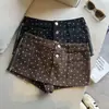Toma real: Shorts de lunares contrastantes en blanco y negro estilo americano con doble pretina al lado, falda-short de dos piezas simuladas, falda-short corta para mujer