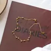 Collar de Borlas de Grano de Oro de 18 Quilates Simple y de Alta Gama Más Vendido en Europa y América Estilo Fresco Ins para Mujer Pulsera Versátil de Acero de Titanio