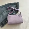 Bolso Pequeño Ligero Estilo Coreano para Mujer Nueva Moda Primavera 2026 Bolso Pequeño de un Solo Hombro para Viajes y Uso Diario Bolso Cruzado de Color Sólido