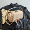 Bolso tipo caja retro de lujo ligero de comercio exterior de alta gama para mujer, nuevo bolso de mano de moda 2026, bolso pequeño cuadrado para hombro y cruzado