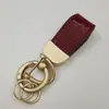 Patrón de cocodrilo Llavero francés mini cadena corta para llave de coche colgante de alta gama llavero decorativo de moda regalo