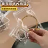Bolsas autosellables para joyería de PVC, bolsas transparentes de sellado, colgables con agujeros, agujeros laterales, bolsas de apretar, bolsas de plástico para aretes, antioxidación