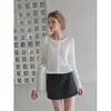 Cárdigan de punto con volantes, huecos, cuello redondo y manga larga color blanco de ummoimoi para mujer, ajuste ceñido para principios de otoño, top de punto de seda helada fresco