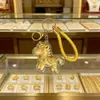 2026 Año del Caballo Dibujo Animado Pony Llavero Colgante de Bolso Zodiaco Caballo de la Riqueza Colgante de Lámina de Oro Regalo Creativo Al por Mayor