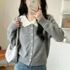 Cárdigan de punto de un solo pecho con cuello de muñeca estilo coreano para mujer, nuevo modelo otoño e invierno 2026, diseño dulce y único, abrigo de suéter no repetitivo