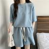 Traje casual de estilo retro americano estilo Hong Kong para mujer, verano, holgado, estilo Ins, de dos piezas, moderno, de manga corta y shorts deportivos