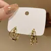 Pendientes únicos de doble fila en forma de C dorados, nuevo estilo de adelgazamiento de alta gama, pendientes de alta gama para mujer, pendientes populares de aguja de plata de verano