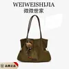 Bolso de mano de felpa y gamuza para mujer 2026 Nuevo Otoño Invierno Tacto de alta gama Retro Versátil Gran capacidad para ir al trabajo Bolso de hombro