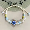 Pulseira de Corda Trançada Cerâmica com Tema de Gato para Mulheres, Joia Estilo Étnico, Pulseira de Resina de Alto Valor Nicho de Luxo Leve Atacado