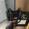 Bolso de hombro único acolchado de rombos estilo pequeño Chanel de lujo ligero, bolsos versátiles, bolso de mano de moda chic con cierre de candado, bolso de axila, comercio exterior, moderno