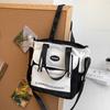 Bolso de lona estilo japonés para estudiantes, bandolera de lona con contraste de colores, ideal para estudiantes de secundaria y de gran capacidad.