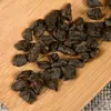 Té glutinoso fragante Pu'er de árbol antiguo té fósil plata rota 500g arroz glutinoso fragante té cocido cabeza de té viejo