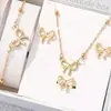 Conjunto de Quatro Peças Elegante e Versátil de Colar, Pulseira, Brincos e Anel com Laço para Mulheres, Conjunto de Joias Moderno e de Alta Qualidade