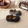 Zapatos de lana estilo francés para niñas 2026 otoño e invierno nuevos zapatos peludos grises para niños zapatos planos con lazo Mary Jane