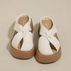 Pantuflas de cuña hueca Baotou para mujer para uso exterior 2025 verano nuevo estilo francés elegantes sandalias planas