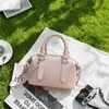 Bolso de mano casual simple estilo coreano para mujer 2026 nueva moda para ir al trabajo color liso almohada bandolera