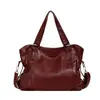 Bolsa de comércio exterior feminina 2026 outono novo versão coreana bolsa de mão de grande capacidade bolsa de ombro transversal casual simples