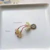 Precio mayorista directo de fábrica pulsera hecha a mano pulsera con colgante diy accesorios pequeños deslizantes colgante de garra de gato lindo Joker