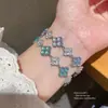 Pulsera de trébol de cuatro hojas de circón para mujer, joyería floral de diseño de nicho de lujo ligero, pulsera de temperamento de moda de alta gama