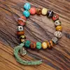 Pulseira Xizang Duobao com Contas Dzi Dente de Tigre, Osso de Iaque Esmaltado, Calcedônia, Turquesa e Contas de Cobre, Design Original com Estilo Étnico