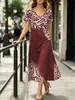 Vestido de verano con estampado étnico degradado transfronterizo europeo y americano, cuello en V, manga corta, holgado, con caída, abertura, midi