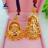 Venda por atacado bronze ouro chapeado chama Guanyin Buda pingente imitação joias de ouro Buming ano presente masculino e feminino casal pingente