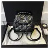 Bolso Acolchado Estilo Tweed para Mujer Mochila Pequeña de Hombro para Viaje 2025 Nuevo Verano Popular Bolso de Cadena Mochila Versátil