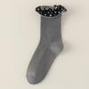 Calcetines de encaje coreanos Dongdaemun de media pantorrilla con estilo de diseño japonés para primavera y otoño, calcetines Lolita holgados combinados con zapatos pequeños de cuero