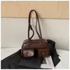 Moda transfronteriza diseño de doble bolsillo bolsa de boliche para mujer nuevo tacto de alta gama bolsa de almohada de una sola pieza bolsa de axila retro moderna