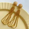 Pendientes Metálicos Largos con Borlas Exagerados Distintivos Europeos y Americanos Pendientes Versátiles Pendientes de Alta Gama Lujo Ligero Nicho Dulces Frescos