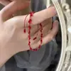 Novo bracelete trançado com contas vermelhas estilo chinês, moda nicho de alta qualidade, simples e requintado, versátil para o dia a dia