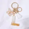 Llavero Colgante de Borla con Letra Inglesa Personalizada de Purpurina Blanca con Resina Epoxi y Colgante de Resina con Pan de Oro, Llavero Sencillo