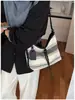 Bolso de mano estilo japonés y coreano para mujer, nuevo modelo 2026, combinación de tela y lona, bolso de hombro versátil vintage, bolso cruzado, bolso para lonchera