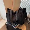 Bolsa de veludo de grande capacidade, nova bolsa de ombro casual outono e inverno 2026, bolsa tote única e simples para aula e trajeto
