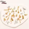 2026 Nuevo Modelo Cobre Chapado en Zirconio Oro Real 18K Cuentas Espaciadoras Cola de Pez Mariposa Campana Accesorios para Pulsera Collar DIY