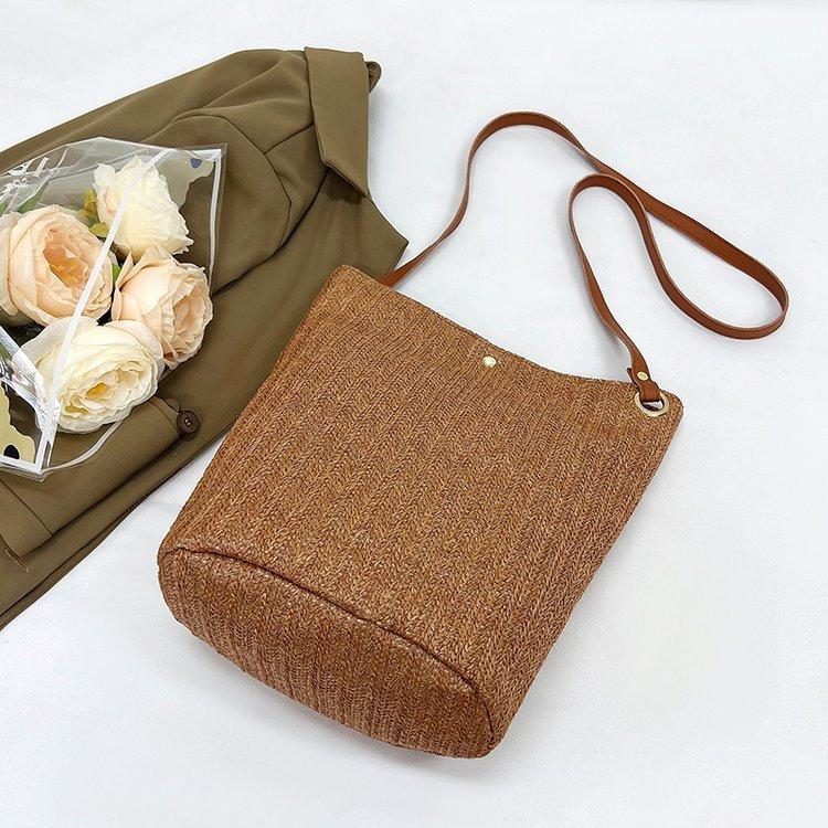 编织包女包新款潮2024夏草编简约百搭小清新水桶包个性单肩斜