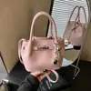 Bolsa Balde Retrô de Design de Nicho Coreano Transfronteiriça 2026 Nova Super Popular Mais Vendida Bolsa Pequena Transversal Texturizada