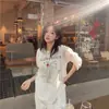 Camiseta de manga larga de algodón puro con estampado blanco y cuello redondo, estilo casual para mujer, holgada y favorecedora, adecuada para otoño e invierno, top versátil