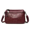Bolso grande de mujer con relieve transfronterizo, nuevo modelo 2026 para madres de mediana edad, bolso para suegra, bolso de hombro y cruzado