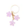 Fabricante Más Vendido Dropshipping Estilo Ins Colgante de Joyería de Tres Flores Doble Cara Goteo de Aceite Multicolor Aleación DIY Llavero para Equipaje Coche