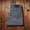 Estación europea primavera y verano fino algodón puro mezclilla niños gris ahumado azul suave General lavado recto casual de negocios Pantalones de mezclilla