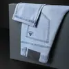 Jeans de seda de hielo de color claro para hombre, nuevos pantalones rectos de otoño para hombre, estilo primavera y otoño, pantalones largos para papás de mediana edad