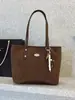 Bolsa Transfronteriza de Gran Capacidad para Mujer Modelo Nuevo 2026 Bolso de Hombro para Estudiante Universitario Bolso Tote Versátil de Moda para Viajes