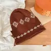 Gorro de punto jacquard Fair Isle con borde enrollado para mujer, cálido y elegante para otoño e invierno, sombrero slouchy de lana versátil y favorecedor.