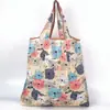 Bolsa de almacenamiento portátil para supermercado de exportación en stock mediana bolsa de compras bolsa de protección ambiental bolso de mano bolsa de compras plegable nailon