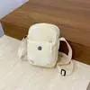 Bolso de mano pequeño de cuadros nuevo, bolso cruzado para mujer y niño, bolso de hombro de cuadros versátil, bolso para teléfono para viaje y salida de estudiantes