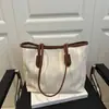 Bolsa Tote Casual da Moda para Mulheres 2026 Verão Novo Estilo Elegante Simples Bolsa de Ombro para Sobrancelha Estilo Coreano Bolsa de Mão da Moda
