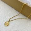 Collar de acero de titanio simple con personalidad de flor de girasol francés retro de alta calidad, nicho de alta calidad, lujo ligero, cadena retorcida