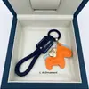 Fique Rico Imediatamente Pingente de Chaveiro de Couro de Vaca Feito à Mão para Carro Lanyard Elegante Simples Exquisito para Casais Masculinos e Femininos