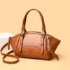 2026 Nuevo Bolso Vintage con Patrón de Cocodrilo Versátil para el Trabajo Hombro Cruzado Bolso para Mujer Forma de Concha Boston Bag Al por Mayor